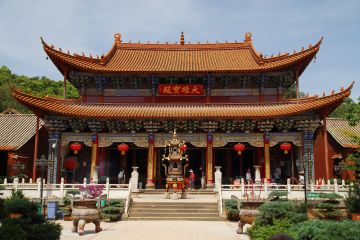 You travel to Yunnan Province and visit the Qiongzhu Temple. There a monk appears and says he has been waiting for you.